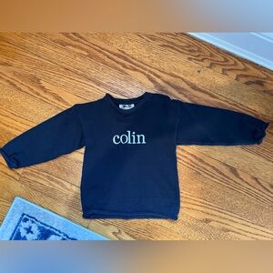 Navy roll neck sweater in size 2, worn once, personalized with the name Colin